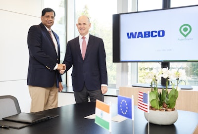 Pictured are Jacques Esculier, WABCO Chairman and Chief Executive Officer (right) and Ashok Yerneni, AssetTrackr Founder and Chief Executive Officer, following the signing ceremony in Brussels, Belgium.