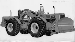 With the double-jointed articulation typical of this design, the Allis-Chalmers 555 push tractor had a turning radius of roughly half its length. It was offered only in 1962 and 1963.