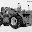 With the double-jointed articulation typical of this design, the Allis-Chalmers 555 push tractor had a turning radius of roughly half its length. It was offered only in 1962 and 1963.