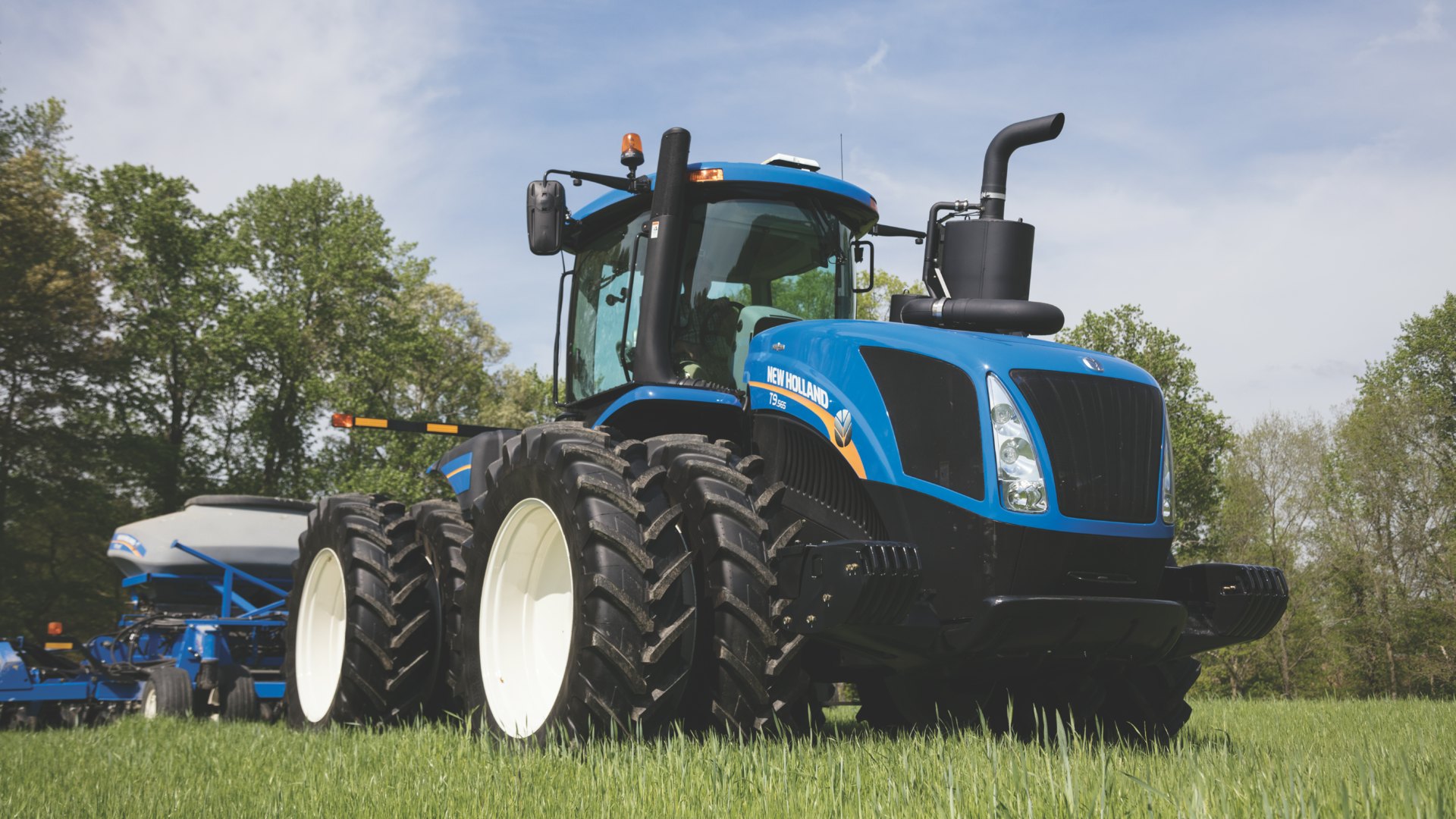 New holland t. New Holland tractors. Трактор New Holland. Трактор New Holland t9. Нью Холланд трактор 9.550.
