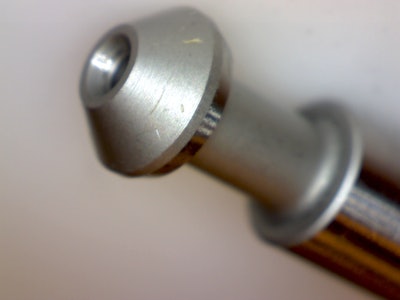 Poppet valve before electropolishing