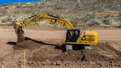 Caterpillar 320 digging a foundation.