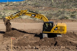 Caterpillar 320 digging a foundation.