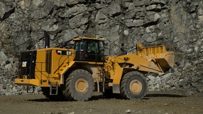 The Cat 988K XE wheel loader features an inverter, motor and generator in place of a mechanical driveline to provide a 25% improvement in fuel efficiency.