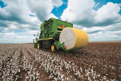 Round-module weighing is standard on all John Deere CP690 Cotton Pickers.