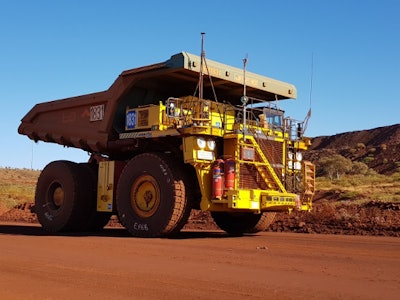 A standard truck 830E with the AHS retrofit kit running in autonomous mode at Rio Tinto’s mine in Australia.