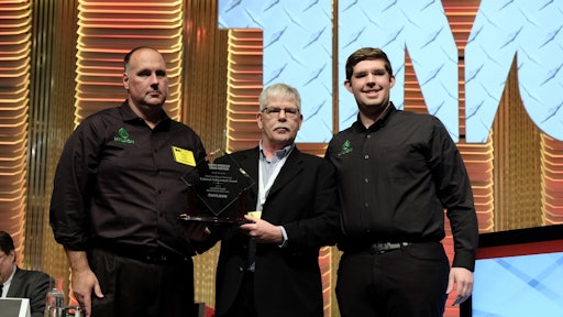 From left to right: Chris Langley, VP of Fleet Relations, Hyliion; Jim Park, award committee chair; and Thomas Healy, founder and CEO, Hyliion.