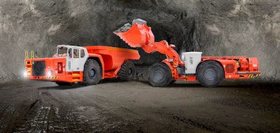 Sandvik’s LH517 underground loader (right) loads material into a Sandvik TH551 truck; the Sandvik LH517 is equipped with an EU Stage V engine solution from Volvo Penta.