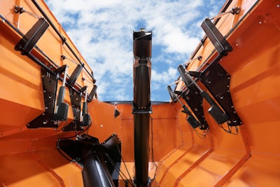 Four HD actuators on the sides of the bin and one in the augur, each of which is programmed to deliver feedback on position via the J1939 CANbus network.