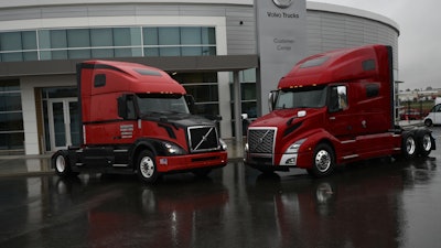 VNL 670s for Southeastern Freight Lines (left) were among the final legacy models produced. VNL 760 models destined for Volvo Trucks dealer S&S Volvo in Lima, OH (right), were the first off the assembly line following completion of the transition.