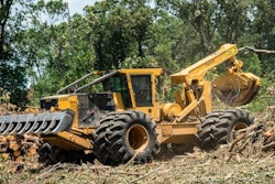 Tigercat 630E Grapple Skidder with Primex Log Stomper Xtreme Flotation Tires size 35.5-32 on the inside and a 24.5-32 on the outside.