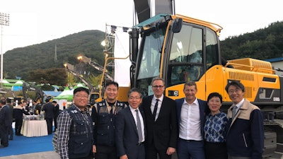 Swedish Ambassador to South Korea Jakob Hallgren (center) with union members and Volvo CE executives SM Yang, Vice President of Excavator Business Platform, (third left); President Melker Jernberg (third right); and Diana Niu, Senior Vice President of Human Resources.