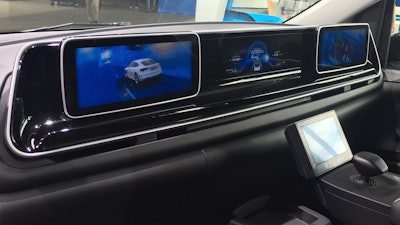 ZF's cockpit concept for autonomous vehicles features three touchscreen displays for driving and other functions.