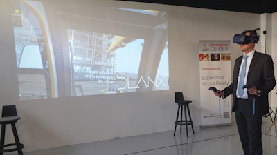 DEUTZ CEO Dr. Frank Hiller tests the newest Augmented Reality technology at the DEUTZ Innovation Center.