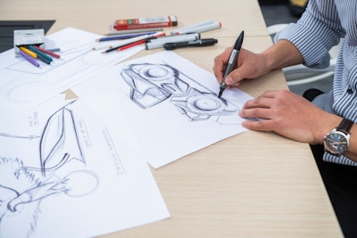 Hand sketching is used in the initial stages to provide a plurality of design ideas.