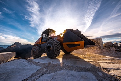 The methane powered concept wheel loader effortlessly tackles tough terrain.