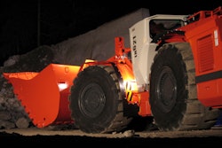 A Sandvik loader operating underground.
