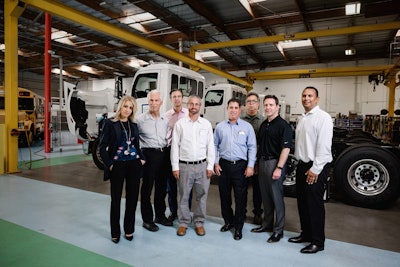 Krista Sohm (left), Vice President and Chief Marketing and Communications Officer, Meritor; Paul Scott, Chief Technology Officer, TransPower; Carl Anderson, Senior Vice President and Chief Financial Officer, Meritor; TransPower’s Joshua Goldman, Vice President, Business Development; Michael Simon, President and CEO; Harry Meyer, Vice President, Service, Safety and Facilities; Meritor’s T.J. Reed, Vice President, Front Drivetrain, NAFTA; and James Taylor, Vice President, Rear Drivetrain, NAFTA.