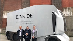 Michelin and Einride executives with the autonomous electric truck.