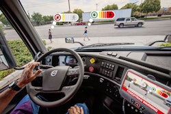 A demonstration of Perceptive Automata's artificial intelligence tracking and signaling in real-time the likely intention to cross and awareness of two pedestrians near a Volvo VNR 300 heavy-duty truck model. The AI is able to track, in parallel and with a 360-degree field of view, a practically unlimited number of pedestrians, cyclists, and vehicles to enhance professional drivers' situational awareness in road environments.
