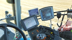 Figure 1: New agricultural tractor cabins are equipped with electronic controls and multiple displays.