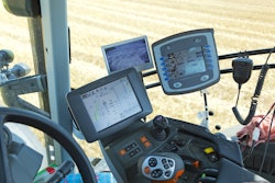 Figure 1: New agricultural tractor cabins are equipped with electronic controls and multiple displays.
