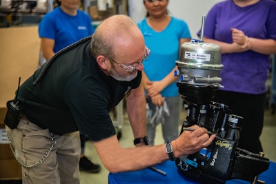 When Bendix Spicer Foundation Brake reached the 3-million-unit production mark of the industry-leading Bendix ADB22X air disc brake in June, team members at the Bowling Green, KY, facility where it’s produced celebrated by signing the milestone brake and a commemorative poster.
