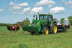 The John Deere 6120M Tractor, matched with the 600R Loader, has the horsepower and versatility to handle a wide variety of chores around the farm.