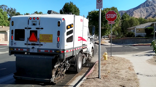 The hybrid Broom Bear sweeper uses a high-capacity battery that can be recharged while driving or when plugged into an electrical outlet.