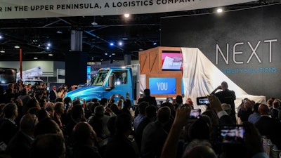 Manufacturers at NACV discussed the three pillars reshaping the commercial truck market - connectivity, automation and electromobility. Pictured is the unveiling of International Trucks' eMV.