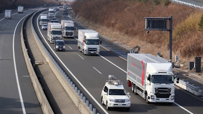 Daimler has tested truck platooning in various parts of the world, including Japan (pictured) to see how the technology would work in various driving scenarios.