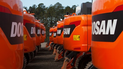 Doosan excavators are prepped for final assembly at a new customization plant in Savannah, GA.