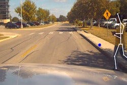 SwRI’s human motion prediction system overlays sparse skeletal features on pedestrians to predict movement. The blue dot in this image predicts the future direction of pedestrian on right. Deep learning algorithms predict motion based on pelvic biomechanical movement.