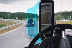 The marked area illustrates the visual gain achieved by replacing traditional rearview mirrors with a camera replacement system.