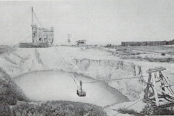 A 1-yd. Slackline Dragline bucket brings in a load of wet gravel.
