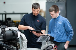 Technical activity occurring at the Isuzu Wixom Prototype Center.