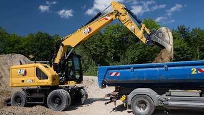 Cat Next Gen Wheeled Excavator Filling Truck