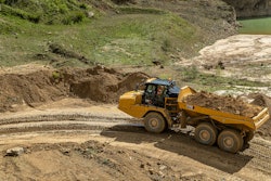 Cat725 Articulated Truckon Dirt Road