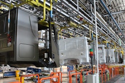 Use of Comau’s MATE exoskeleton are helping relieve fatigue for workers at an IVECO production facility.