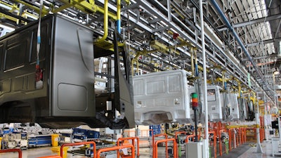 Use of Comau’s MATE exoskeleton are helping relieve fatigue for workers at an IVECO production facility.