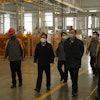 SDLG CEO and Chairman Wang Zhizhong and top SDLG executives monitor the measures put in place to ensure the health and safety of employees as SDLG’s factory reopens.