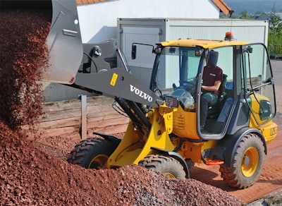 The L25 Electric compact wheel loader in use at a customer site.