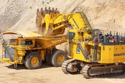 A Komatsu AHS truck and hydraulic excavator work together at the Komatsu Proving Grounds in Arizona.