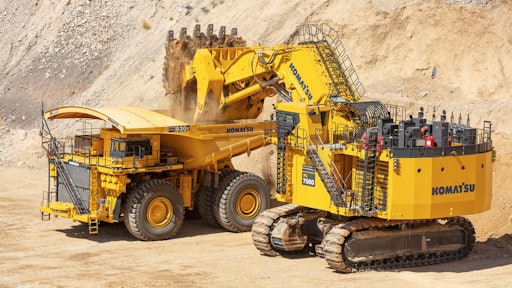 A Komatsu AHS truck and hydraulic excavator work together at the Komatsu Proving Grounds in Arizona.