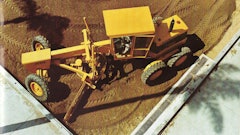 A closer look at an early Deere 570 with articulated frame.