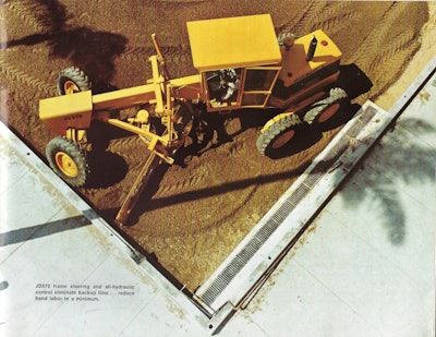 Try doing this with a rigid-frame grader! An early Deere 570 shows its ability to blade into close quarters.