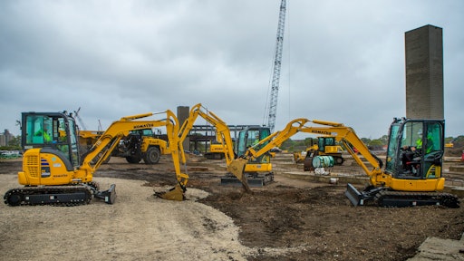 Komatsu PC35 excavators break ground at the new site of Komatsu Mining.