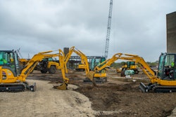 Komatsu PC35 excavators break ground at the new site of Komatsu Mining.