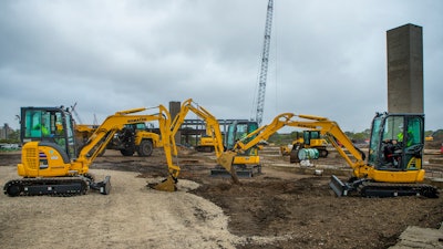 Komatsu PC35 excavators break ground at the new site of Komatsu Mining.
