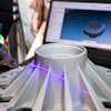 A 3D scan and coordinate measuring machine (CMM) inspection of a representative legacy wheel was completed. The result of this data collection was a surface model of the component.